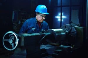 manufacturing worker with safety equipment on